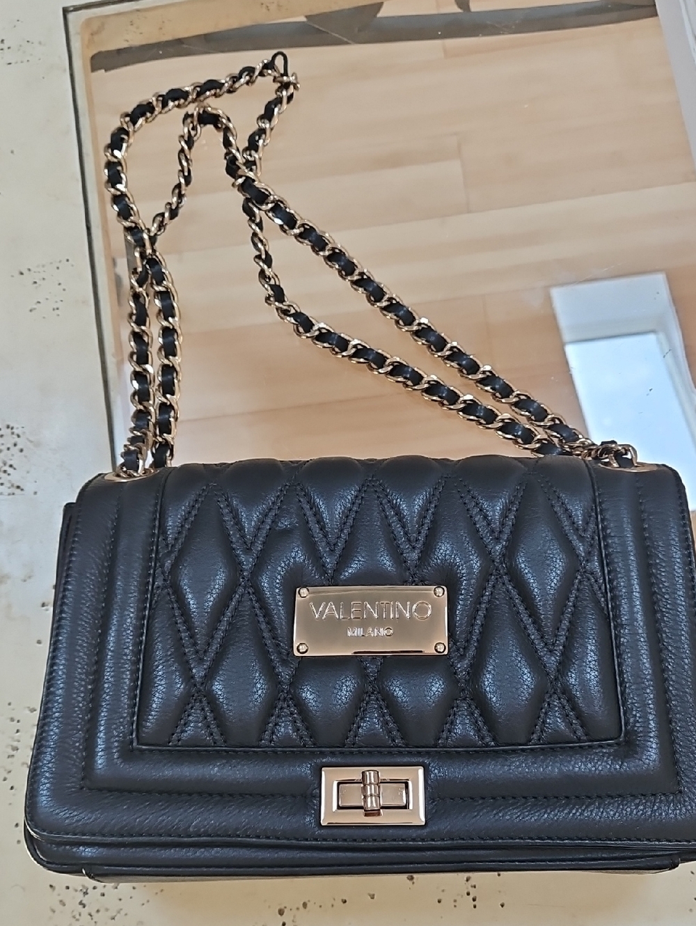 Mario Valentino Black Quilted Shoulder Bag with Gold Hardware